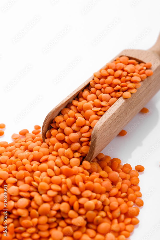 raw lentils on a white acrylic background raw lentils on a white acrylic background
