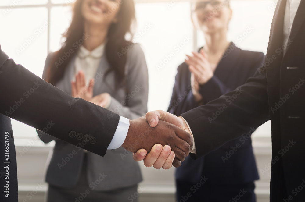Handshake at business meeting, it is a deal