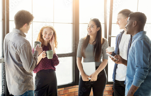 Coffee break chat at office photo