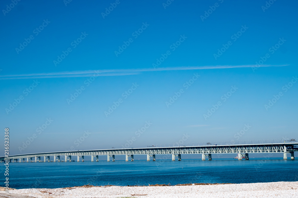 The classic view of the bridge along with Osaka skyline is the beautiful blue sky in the morning. The classic view of the bridge along with Osaka skyline is the beautiful blue sky in the morning.