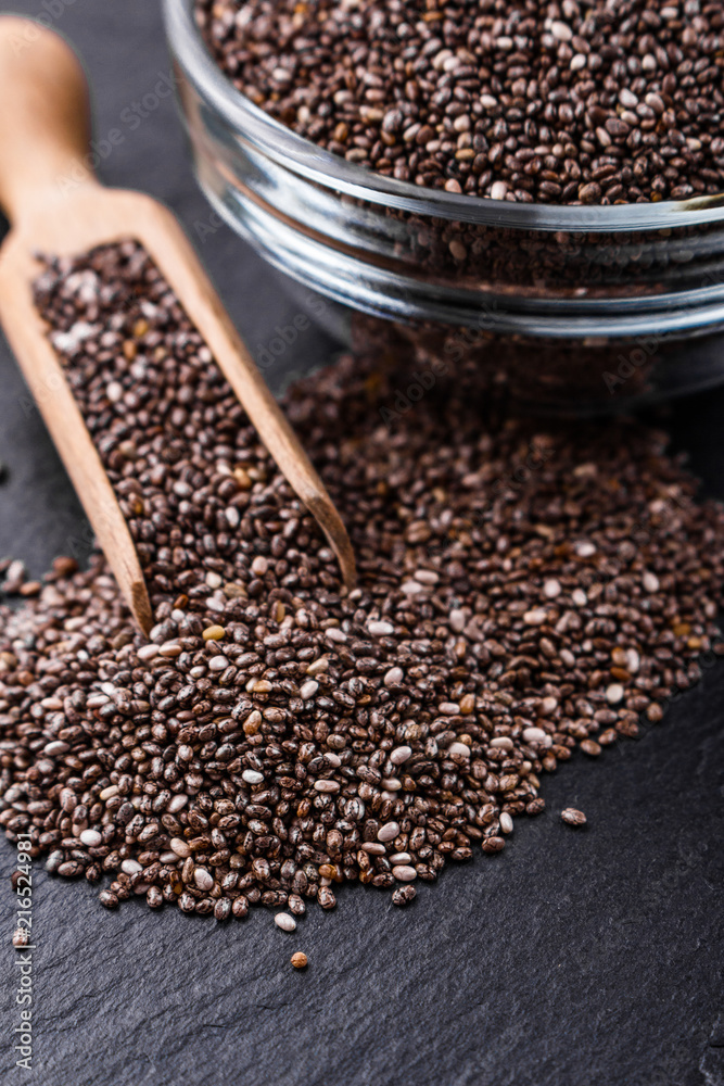 chia seeds on a dark stone background