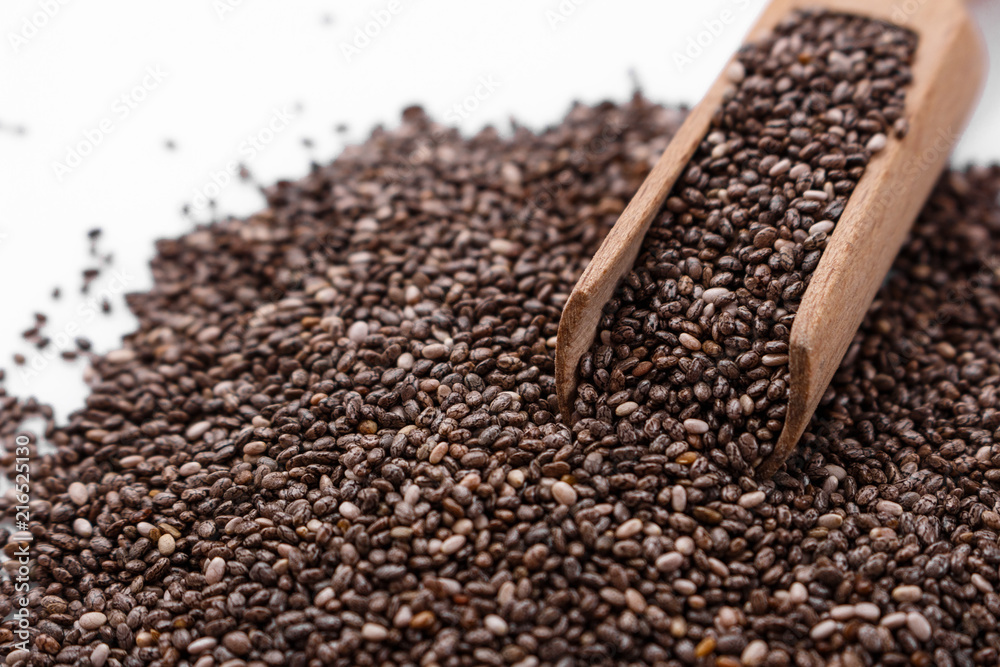 chia seeds on a white acrylic background chia seeds on a white acrylic background