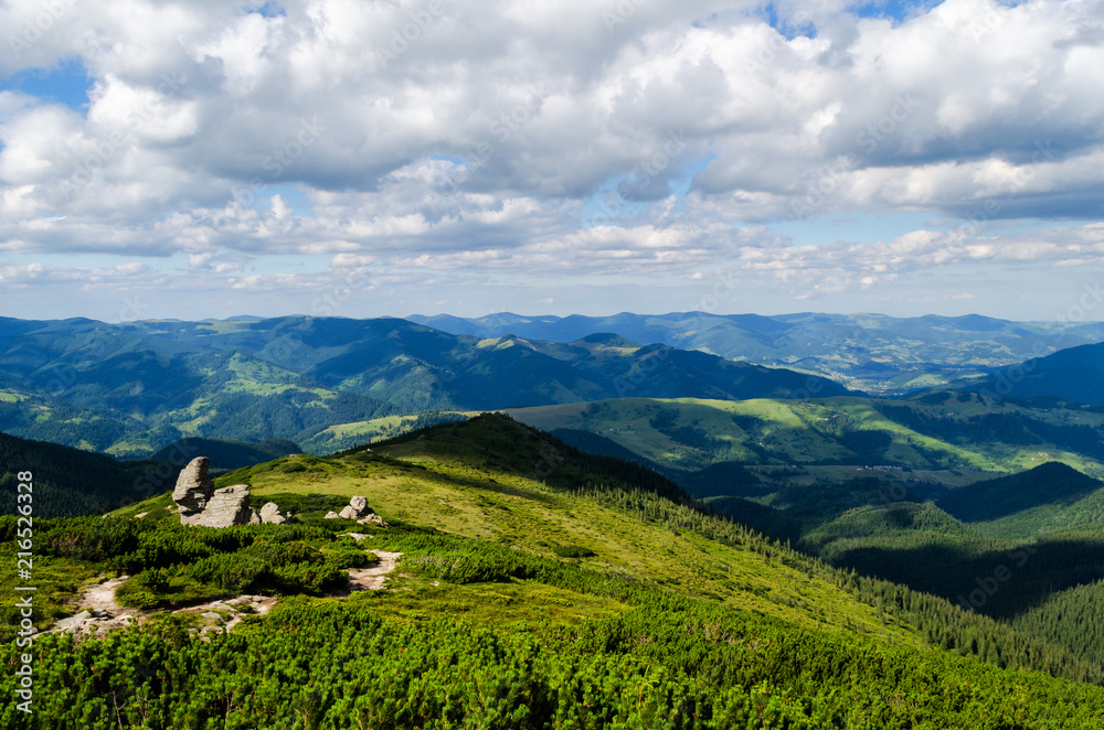 dangerous path in the high mountains against the blue sky