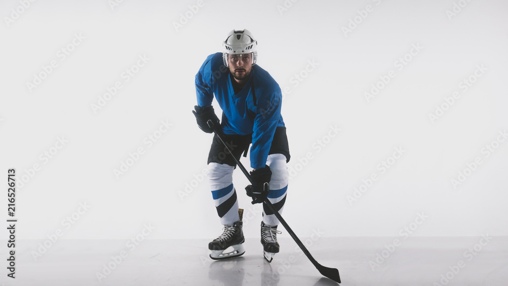 Hockey Player With Green And White Uniform On Ice Background