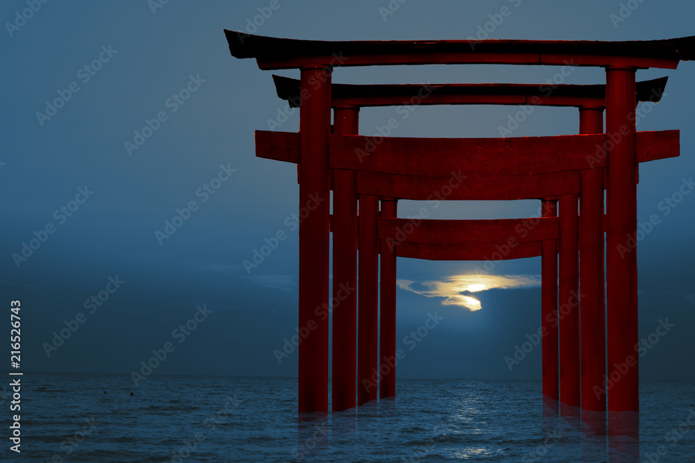 Naklejka premium silhouette torii wooden Japanese pillar stand on sea sunset sky