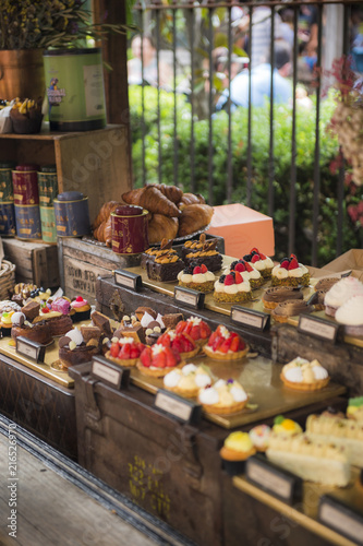 Different types of cakes in pastry shop photo