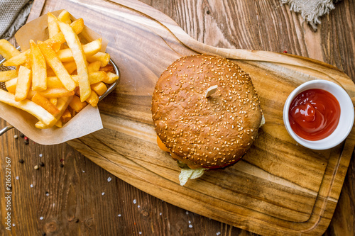 Hamurger with fries and ketchup photo