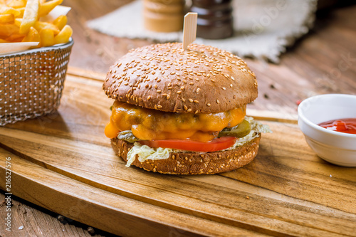 Hamurger with fries and ketchup photo