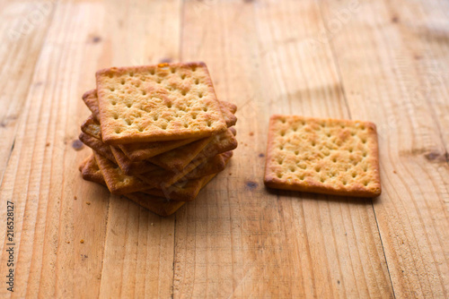 Biscuits crackers on wooden table. selective focus.