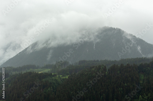 Overcast rainy and moody Dachstein Massif mountain ranche