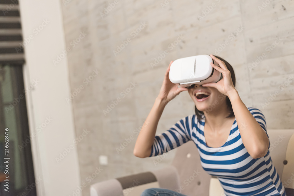 woman using vr headset woman using vr headset