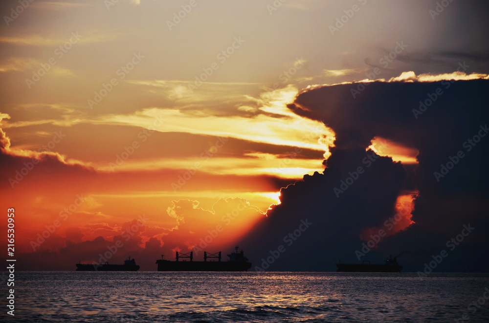 Fototapeta premium Landscape, sunset on the sea by ship.