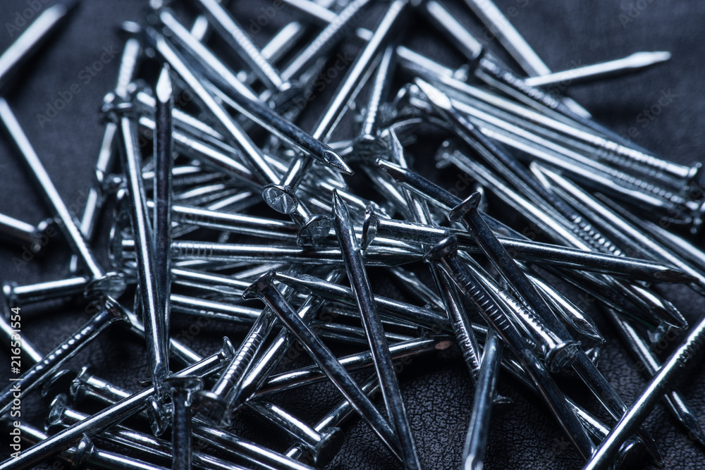 Nail pile, masonry nail, concrete nail background Nail pile, masonry nail, concrete nail background