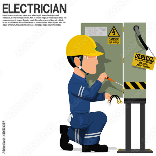 An electrical worker is fixing the electrical cabinet
