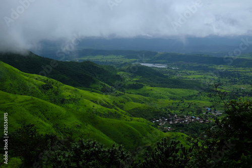 Lush green monsoon nature landscape mountains, hills, Purandar, Pune, Maharashtra, India  © Sandeep