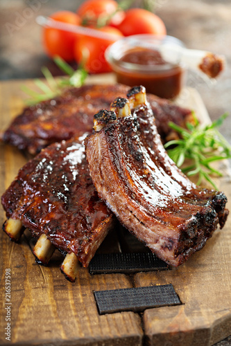 Stampa su tela Grilled and smoked ribs with barbeque sauce