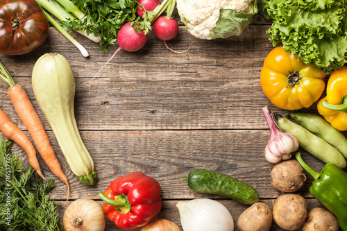 Organic fresh vegetables on wooden table