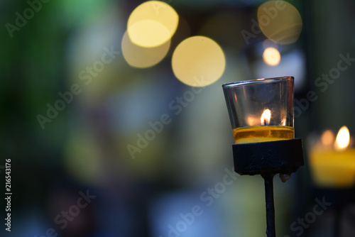 candle in glass and dark background