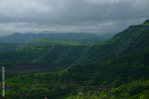 Lush green monsoon nature landscape mountains, hills, Purandar, Pune, Maharashtra, India  © Sandeep