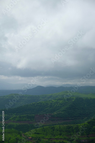 Lush green monsoon nature landscape mountains, hills, Purandar, Pune, Maharashtra, India 