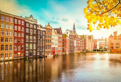 Typical dutch historic houses over autumn canal, Amsterdam, Netherlands