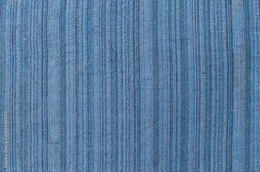 Silk and linen blue color natural fabric texture closeup as textile background Silk and linen blue color natural fabric texture closeup as textile background