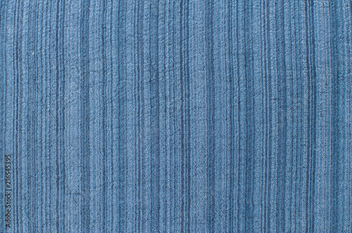 Silk and linen blue color natural fabric texture closeup as textile background