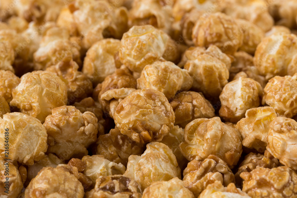 Close-up caramel popcorn, isolated on white background Close-up caramel popcorn, isolated on white background