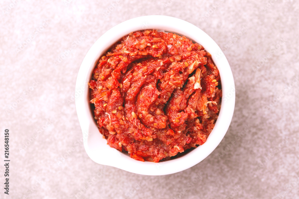 Traditional Maghrebi hot chili pepper sauce paste harissa. adjika Traditional Maghrebi hot chili pepper sauce paste harissa. adjika