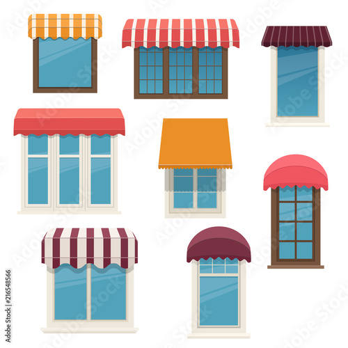 Windows with outside awnings. Architecture elements of the building facades