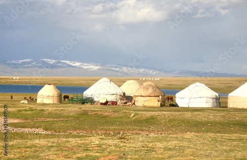 The ger camp in a large meadow at Song kul lake , Naryn of Kyrgyzstan