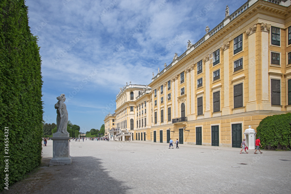 Vienna, Austria, April, 30, 2018. Tourists walk around the Royal Palace Schoenbrunn in Vienna, Austria. This Palace was the summer residence of Austrian Emperors.