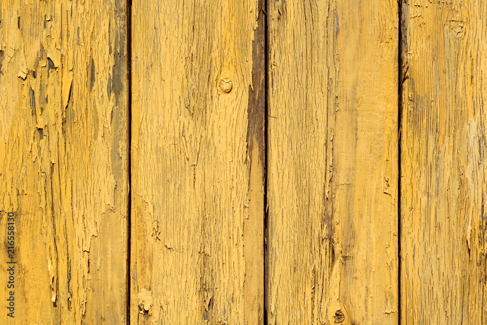 Naklejka premium Yellow color old grunge wooden fence pattern.