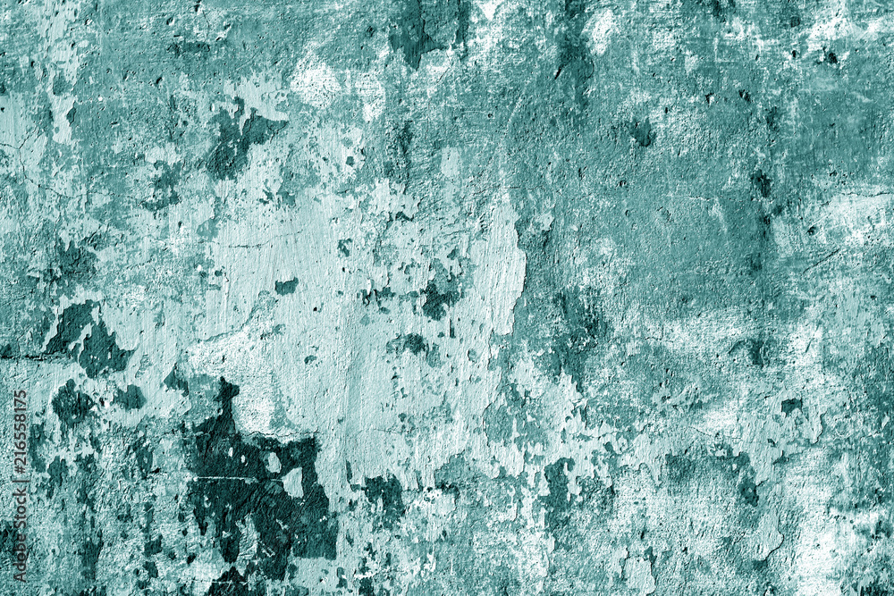 Grungy cement wall in cyan tone.