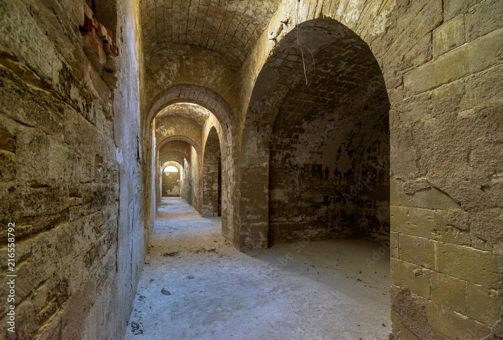 Stone arches in old fortess, perspective, passageway, Totleben fortess near Kerch
