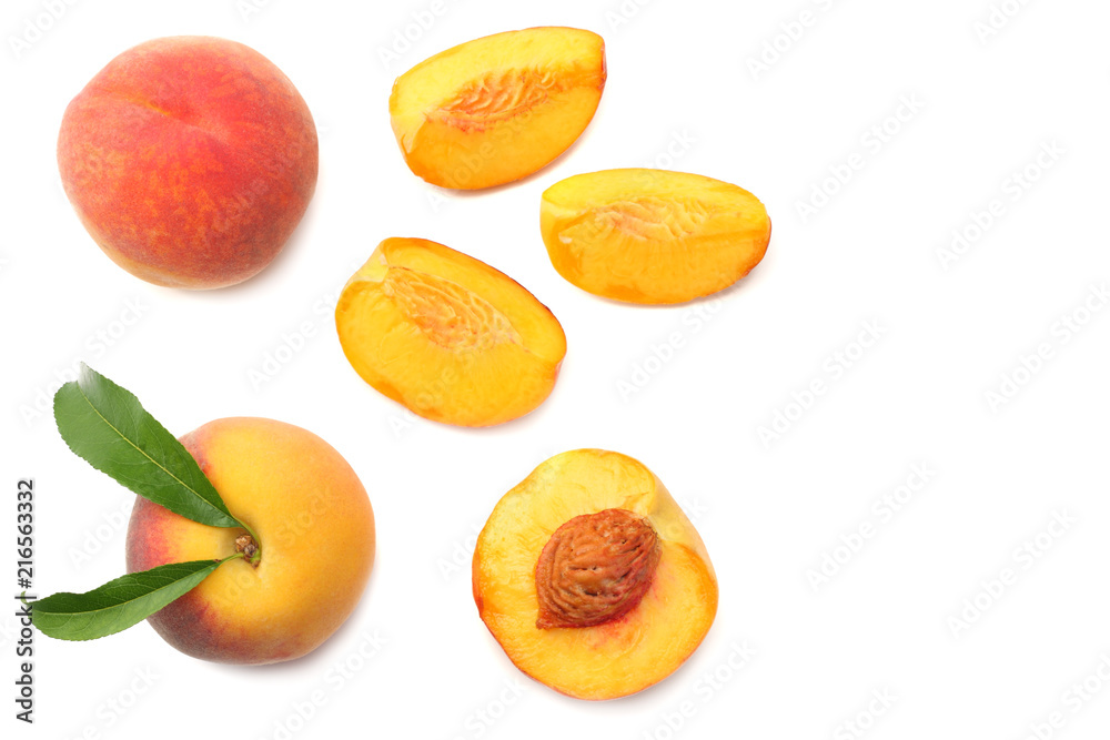 peach fruit with green leaf and slices isolated on white background. top view peach fruit with green leaf and slices isolated on white background. top view