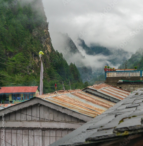 Above the tea house roofs in the town of Chame on the Annapurna 
