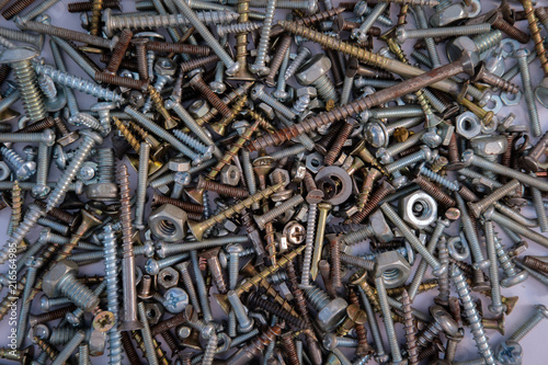 Nuts, bolts, fasteners, screws and other harware for background photo