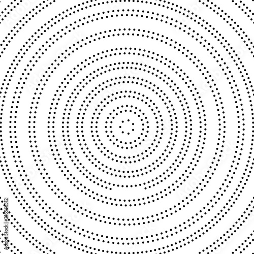 Abstract dotted background. Radial pattern, halftone pattern. Vector © vladystock