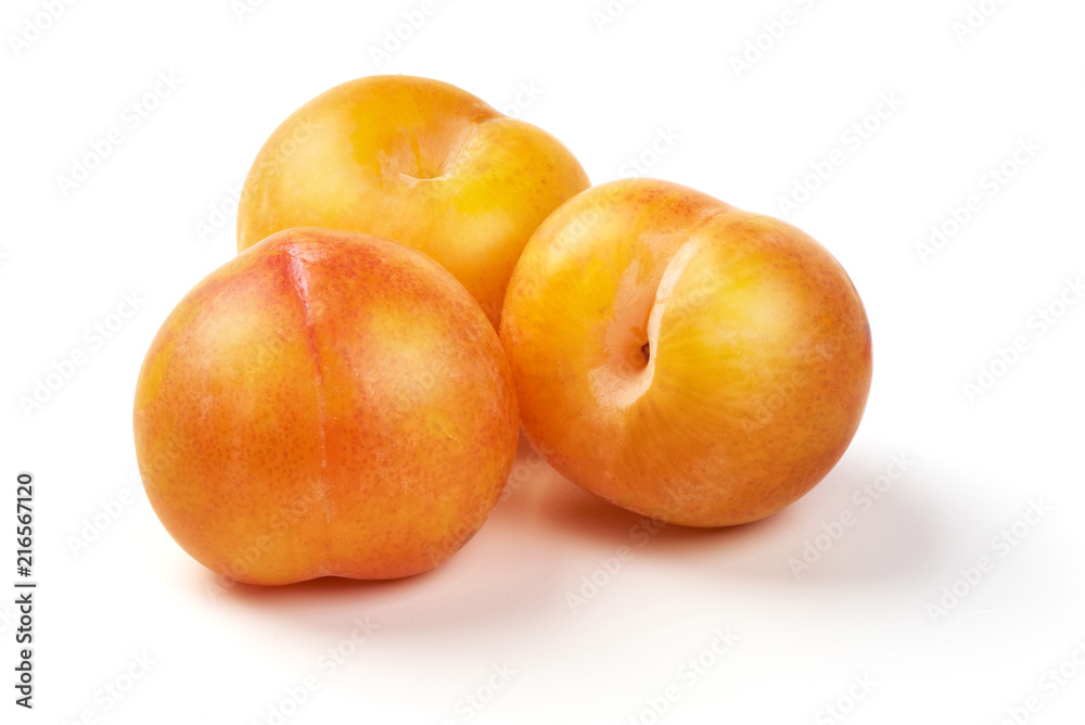 Juicy yellow plums, isolated on white background. Juicy yellow plums, isolated on white background.