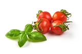 Cherry Tomatoes with green fresh basil leaf isolated on white background
