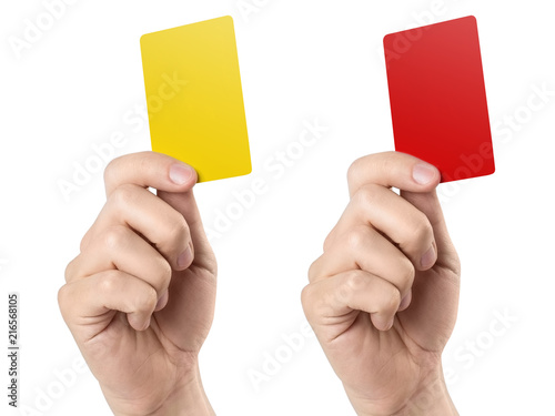 Foto Male football (soccer) referee hand holding yellow and red cards, isolated on wh
