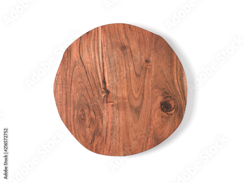 Round wooden tray or cutting board isolated on white background. Top view of empty kitchen trendy rustic wooden tray saw cut imitation. Isolated on white with clipping path. Copy space for text.