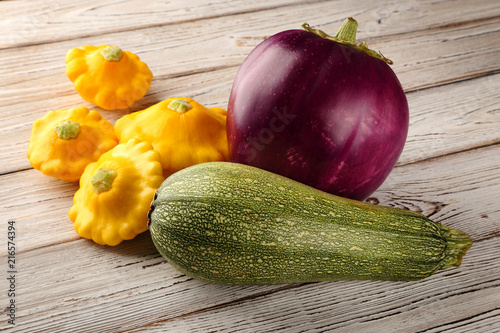 Fresh vegetables on a wooden table. photo