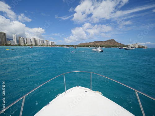 front of a yacht boat tip point of view toward Honolulu city Diamond Head Hawaii 