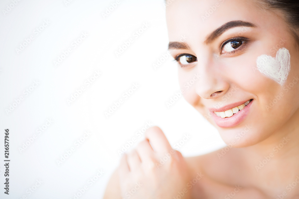Skincare. Woman With Healthy Face Applying Cosmetic Cream Under The Eyes Skincare. Woman With Healthy Face Applying Cosmetic Cream Under The Eyes