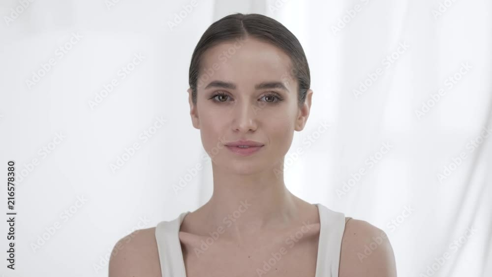 Attractive Woman Counting To Five On Fingers Attractive Woman Counting To Five On Fingers