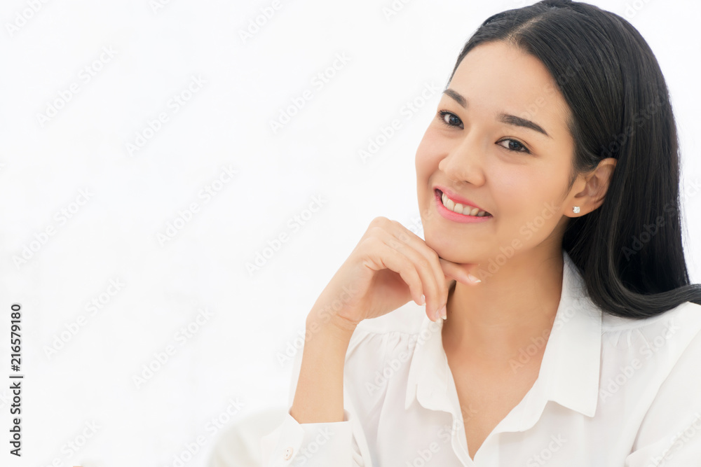 Smiling young women isolated on white background. Asian happy girl looking at camera. Smiling young women isolated on white background. Asian happy girl looking at camera.