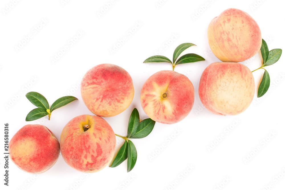 ripe peaches with leaves isolated on white background with copy space for your text. Top view. Flat lay pattern ripe peaches with leaves isolated on white background with copy space for your text. Top view. Flat lay pattern