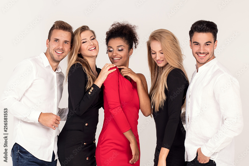 Cheerful elegant people smiling, posing together. Cheerful elegant people smiling, posing together.